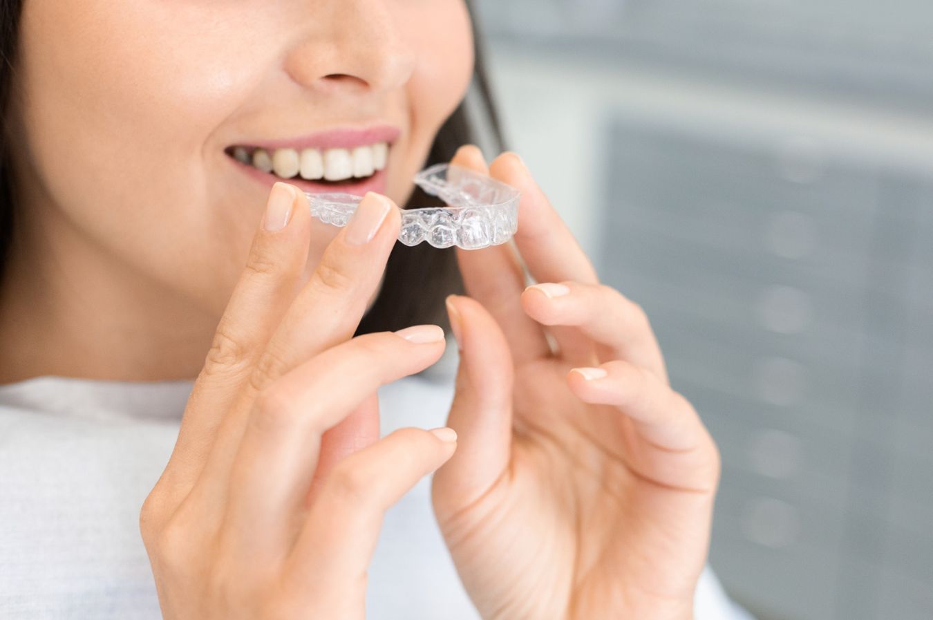 Photo of a patient wearing their invisalign