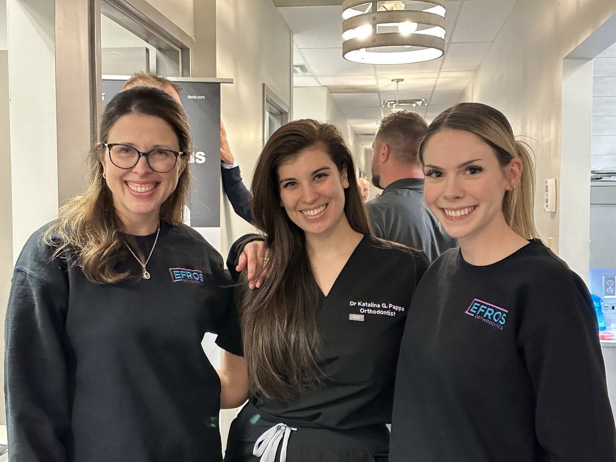 Efros Orthodontics team members smiling in the office